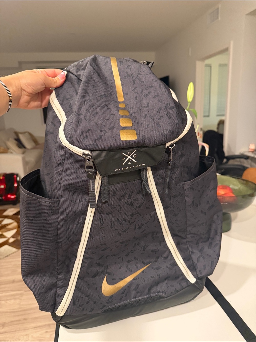 Nike Black Backpack with Gold Accents